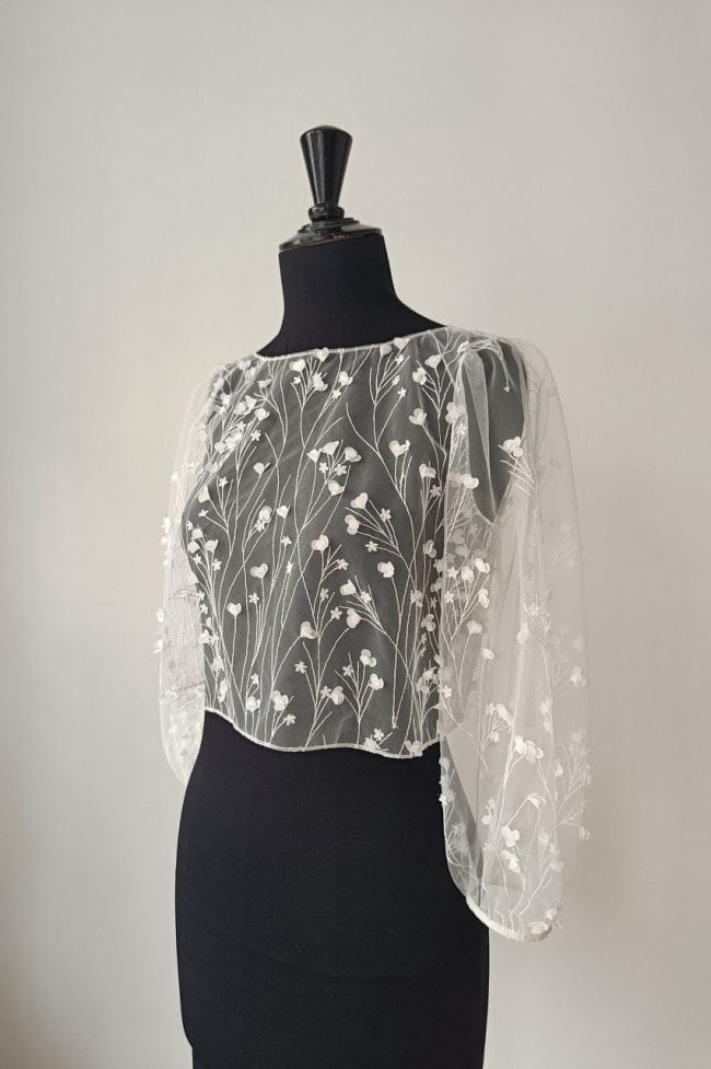 Blouse mariée à manches longues en dentelle 3D.